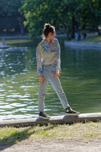 Pretty girl on lake border
